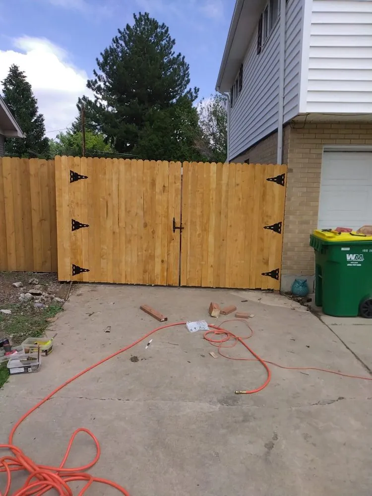 Professional lawn mowing service for outdoor upgrades in Aurora, CO by Manny’z Fence & Tree’z