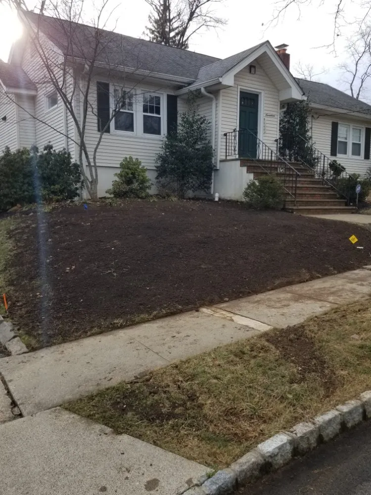 Custom landscape installation in Paterson, NJ by Manuel & Family Landscaping
