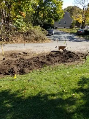 Manuel & Family Landscaping Logo