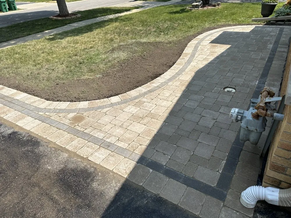 Custom landscape installation in Waukegan, IL by Manuel Brick Paving & Landscaping