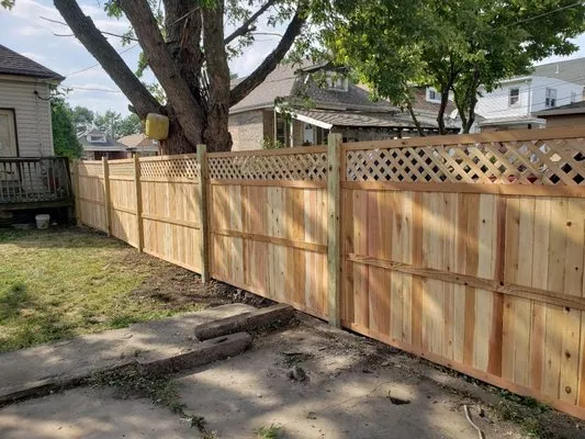 Manuel Landscaping Fence & Patio Logo