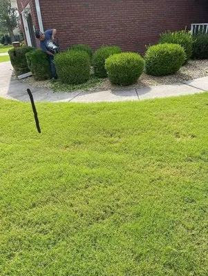 Manuel Lawn Service Logo