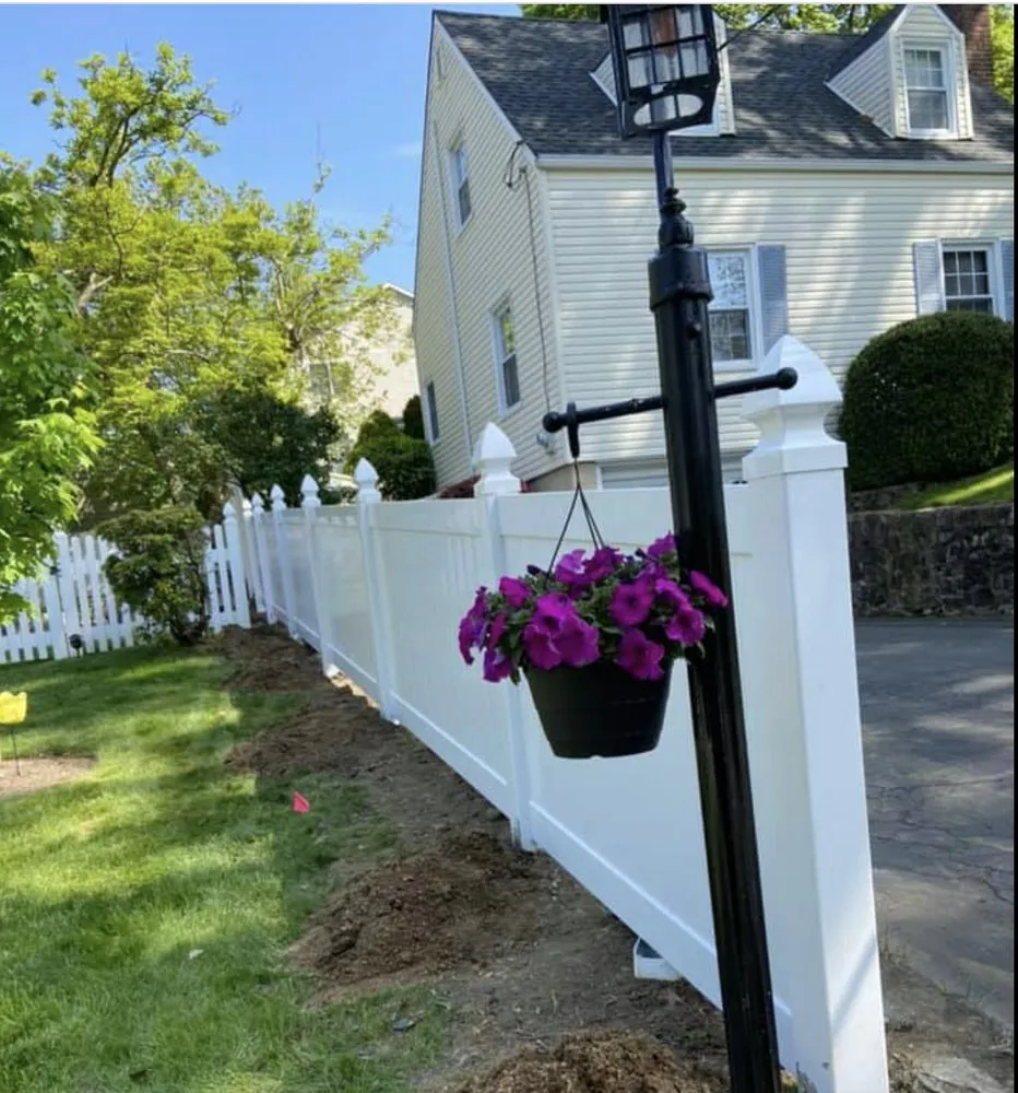 Professional yard cleanup service for beautiful yards across Peekskill, NY - Manuels Fence and Construction