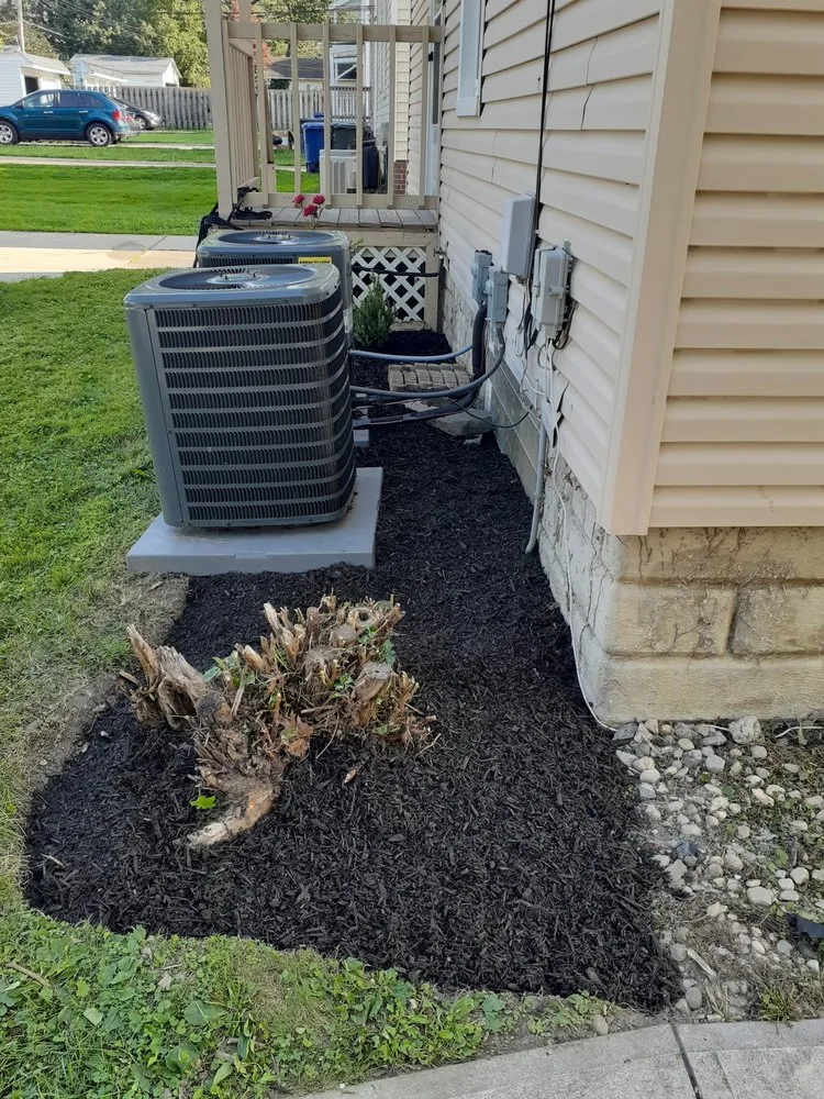 Professional landscape installation for outdoor upgrades in South Euclid, OH by Manzo Landscaping