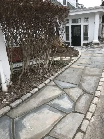 Custom landscape design in Lake Mohegan, NY by Marcos Construction & Landscaping