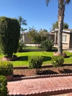 Local lawn mowing service with custom design in Adelanto, CA by Marco's Gardening & Landscaping Services