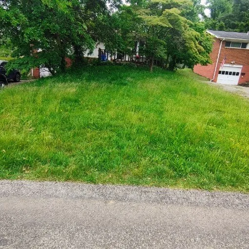 Professional lawn mowing service in Rankin, PA by Marcos Lawn Care and Snow Maintenance