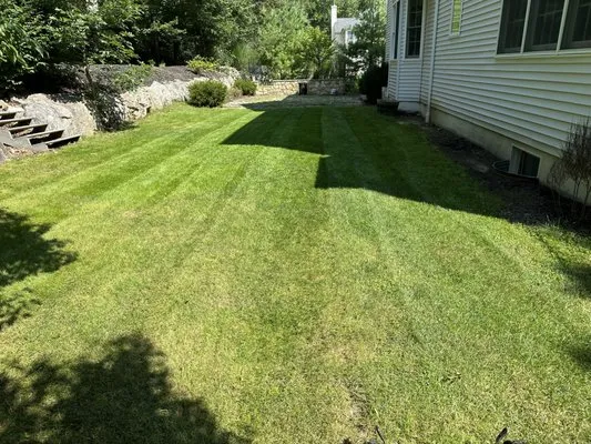 Marc’s Lawn Care Logo