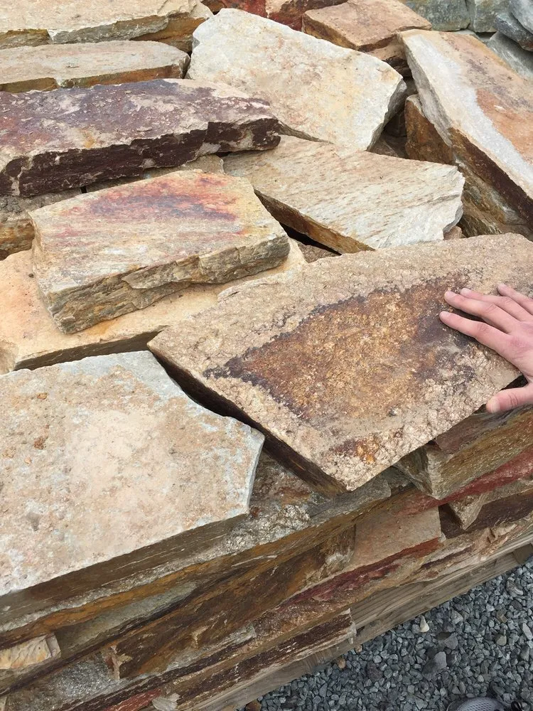 Custom lawn mowing service for homes in Issaquah, WA by Marenakos Rock Center