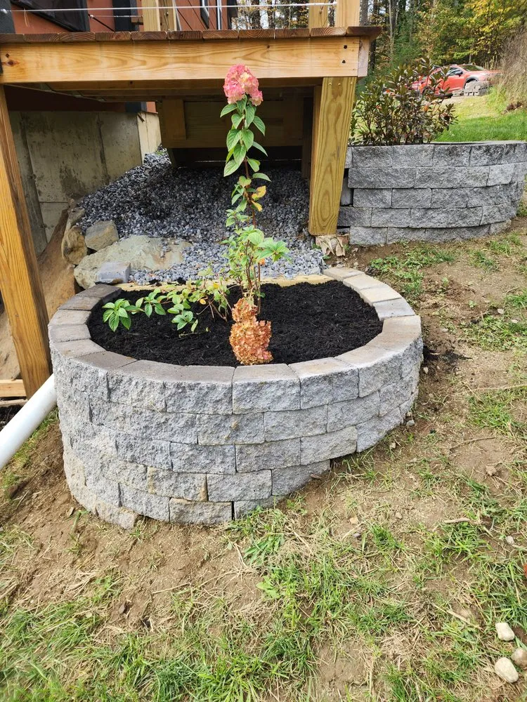 Trusted lawn care service in Moosup, CT by Maria Does it All