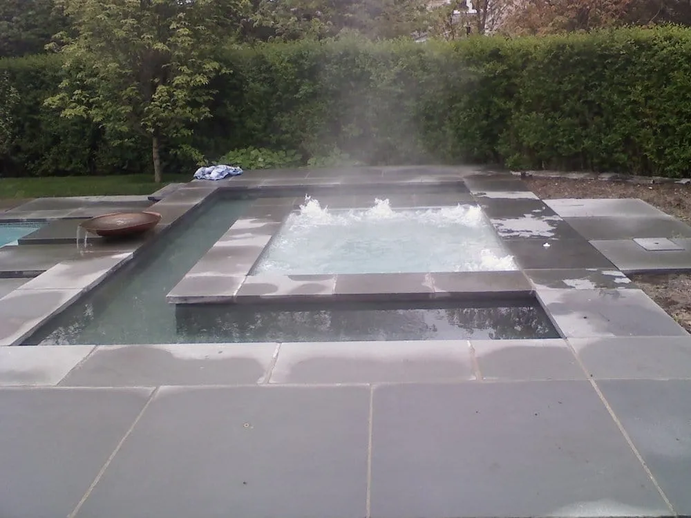 Custom outdoor landscaping for homes in Hyannis, MA by Marichal Swimming Pool Construction