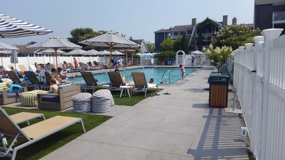 Professional lawn care service for beautiful yards in Hyannis, MA by Marichal Swimming Pool Construction