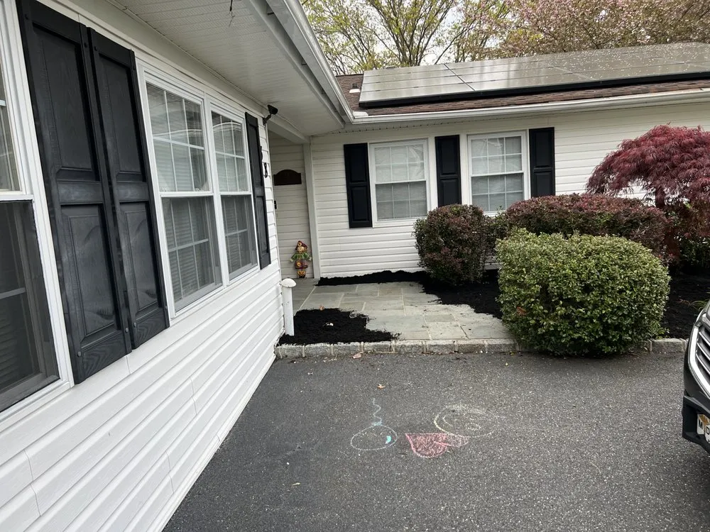 Affordable landscape design for residential properties in Central Islip, NY by Mario’s Landscape