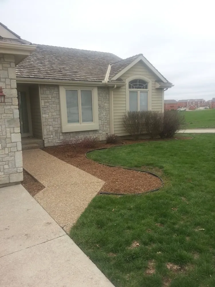 Expert residential landscaping in Lawrence, KS by Marios