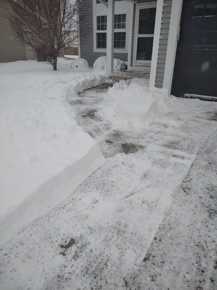 Affordable lawn mowing service in Normal, IL by Markeis Andrews Superior Services