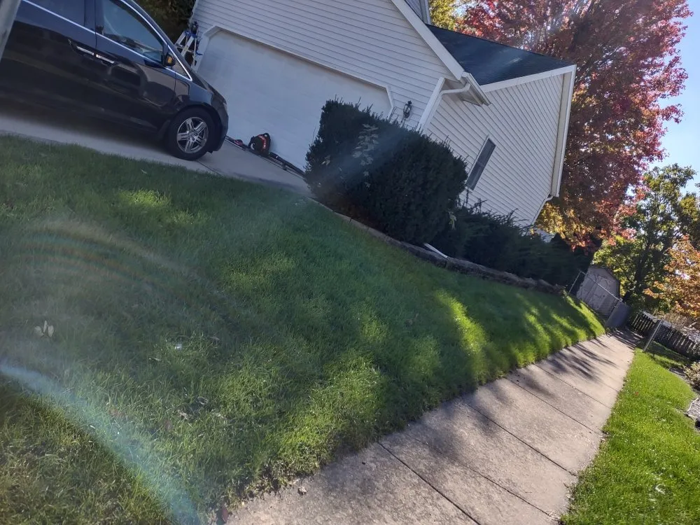 Local lawn mowing service for year-round maintenance in Normal, IL by Markeis Andrews Superior Services