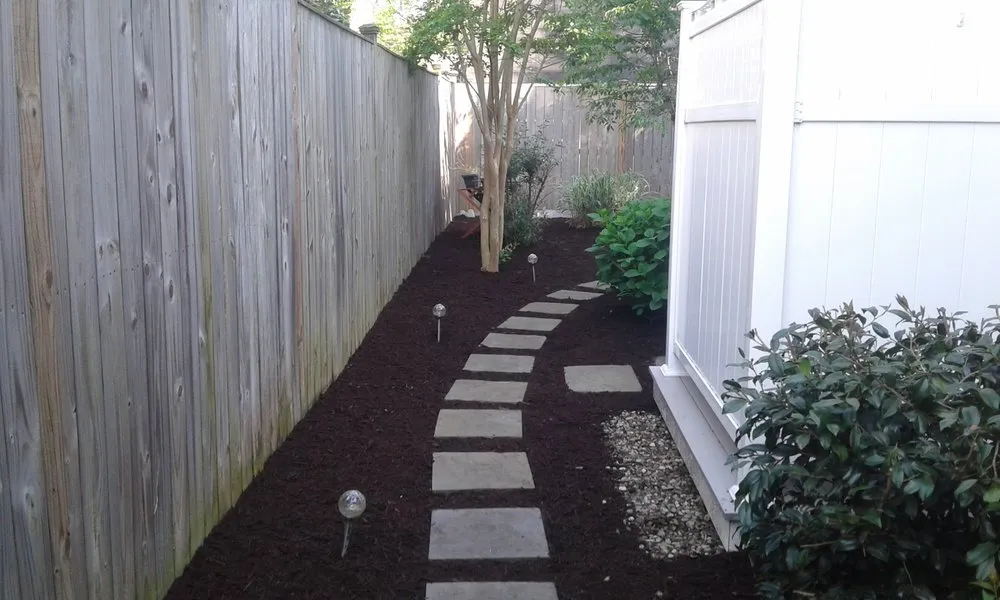 Custom landscape installation in Nassau, DE by Mark's Lawn Care