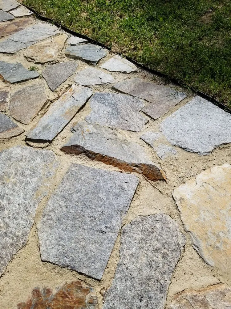 Affordable lawn mowing service for outdoor upgrades across Yorktown, VA - Marlowe’s Outdoor Kitchens and Patios