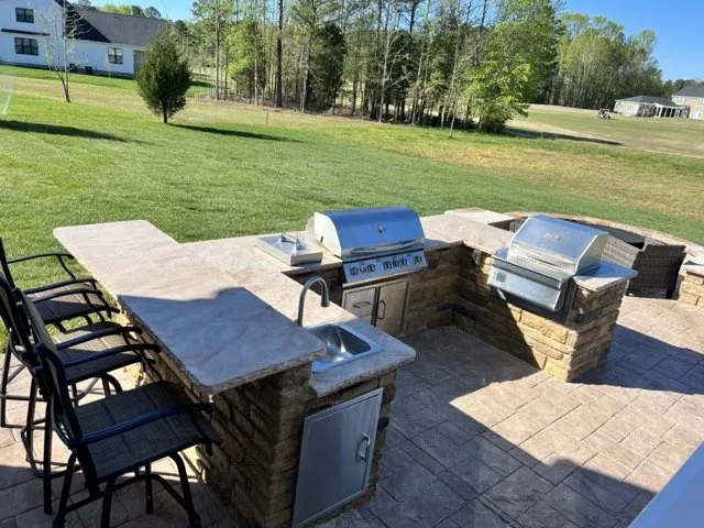 Reliable lawn mowing service for outdoor upgrades across Yorktown, VA - Marlowe’s Outdoor Kitchens and Patios
