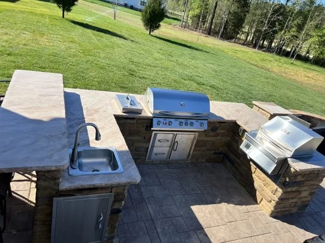 Custom lawn mowing service for homes in Yorktown, VA by Marlowe’s Outdoor Kitchens and Patios