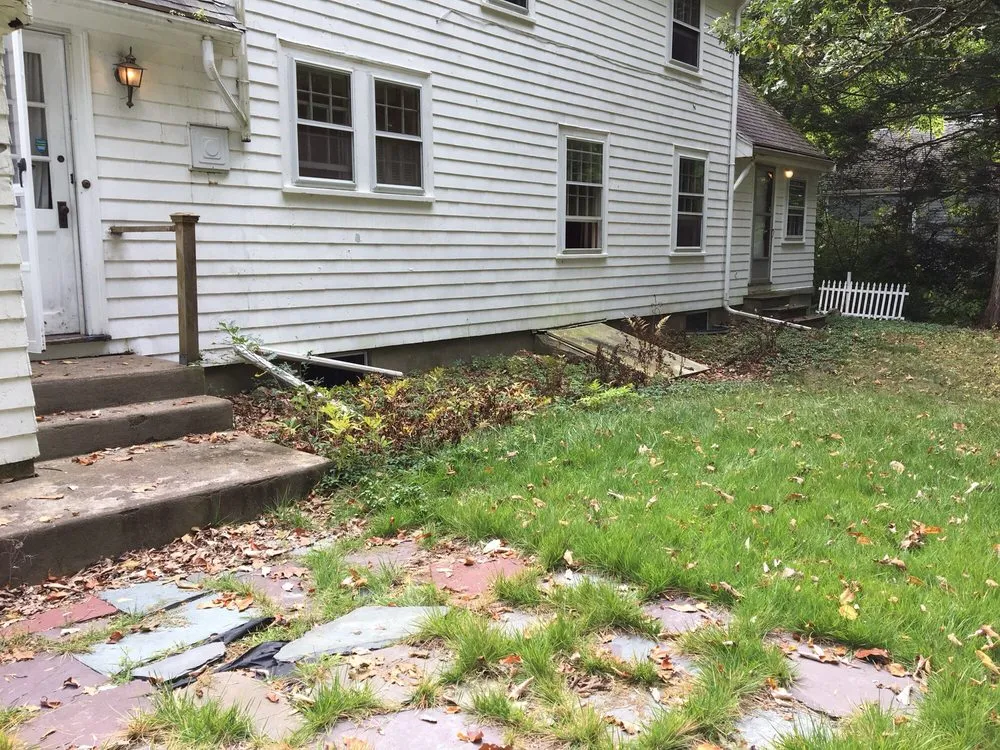 Affordable yard cleanup service for residential properties in Waltham, MA by Marquense Landscaping