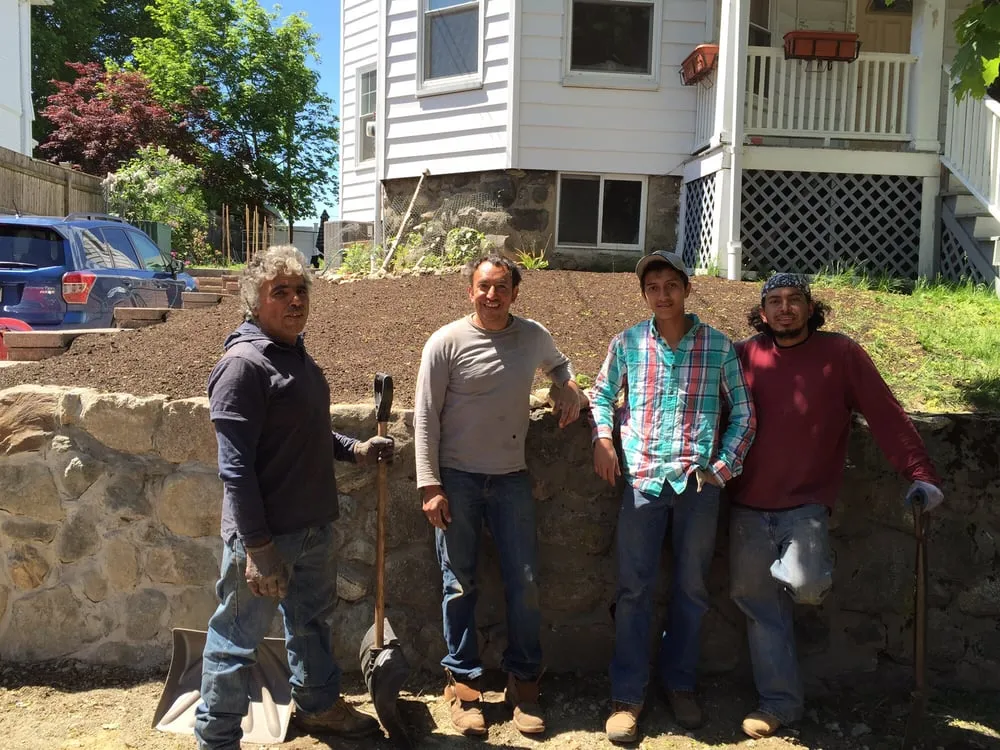 Custom lawn mowing service for homes in Waltham, MA by Marquense Landscaping