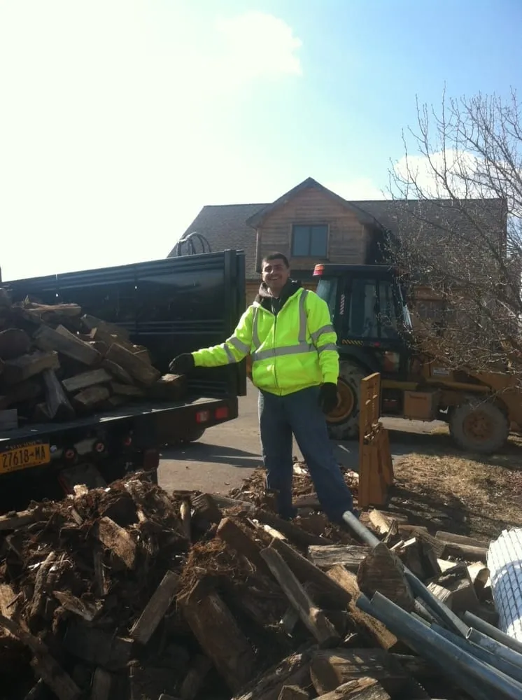 Reliable lawn mowing service with custom design in Melville, NY by Marra Landscaping