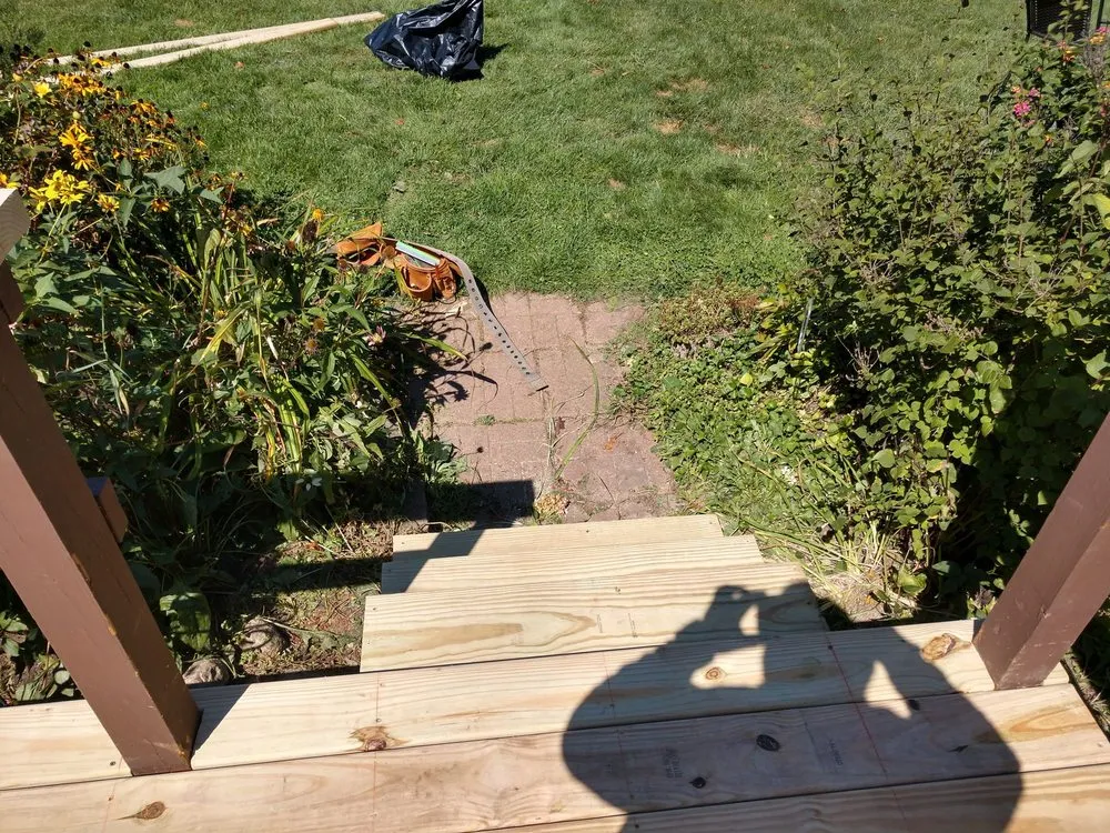 Professional lawn mowing service for outdoor upgrades in Monon, IN by Marroquin Renovations & Services