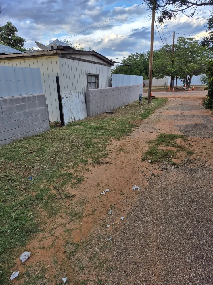 Custom yard cleanup service for year-round maintenance in Lamesa, TX by Martens Small Yard Mowing and Trimming