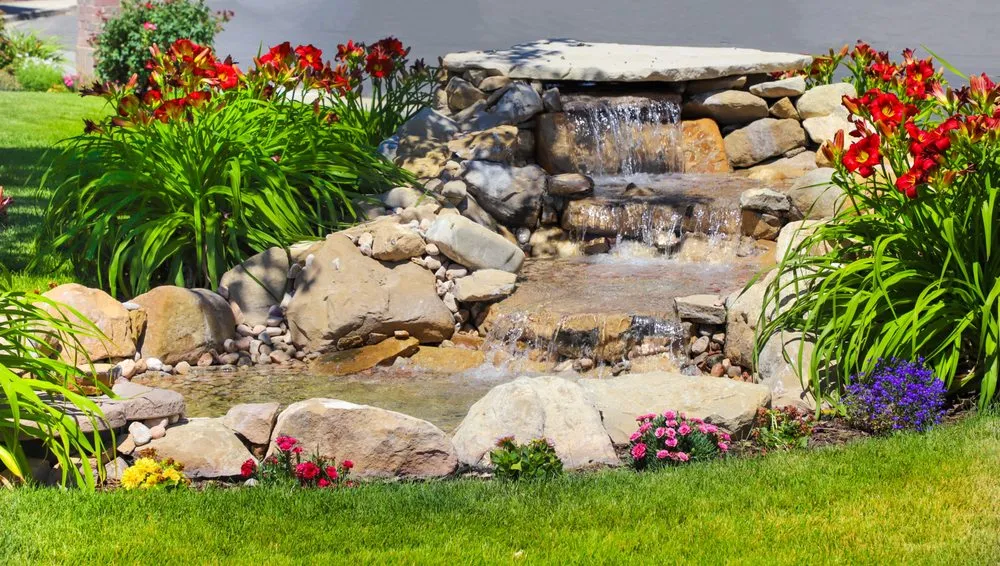 Expert lawn mowing service for homes in Orem, UT by Martin and Quin Landscape Design