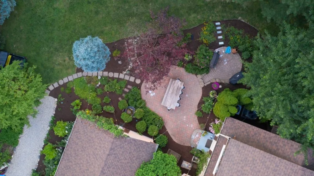 Custom residential landscaping with custom design in Frankfort, IN by Martinez Land Art Services