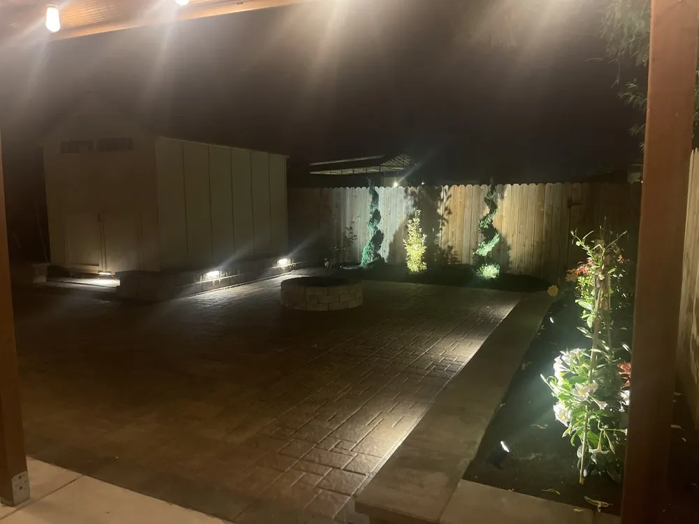 Custom yard maintenance with custom design in Kerman, CA by Martinez landscape services