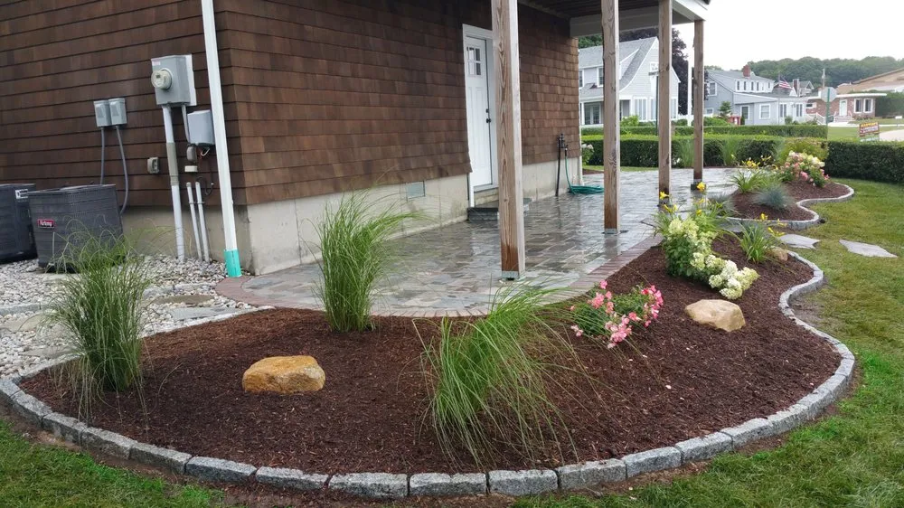 Affordable lawn care service in Cranston, RI by Martinez Landscaping and Construction