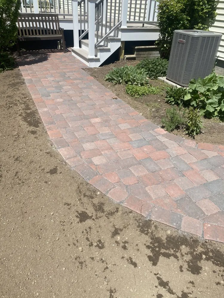 Custom lawn mowing service for homes in Cranston, RI by Martinez Landscaping and Construction