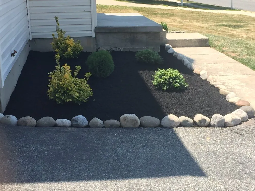 Expert yard maintenance for year-round maintenance in New Castle, DE by Martinez Landscaping