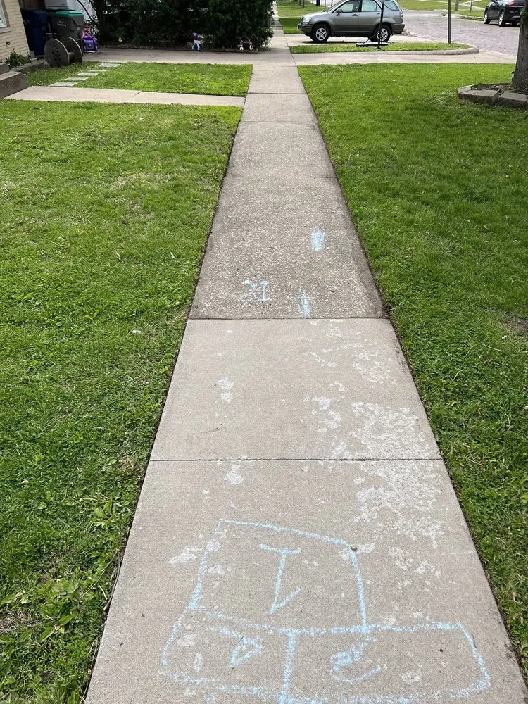 Custom garden landscaping for year-round maintenance in West Liberty, IA by Martinez Landscaping