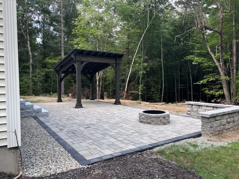 Trusted yard cleanup service for year-round maintenance in Manchester, NH by Martin's Landscaping & Construction