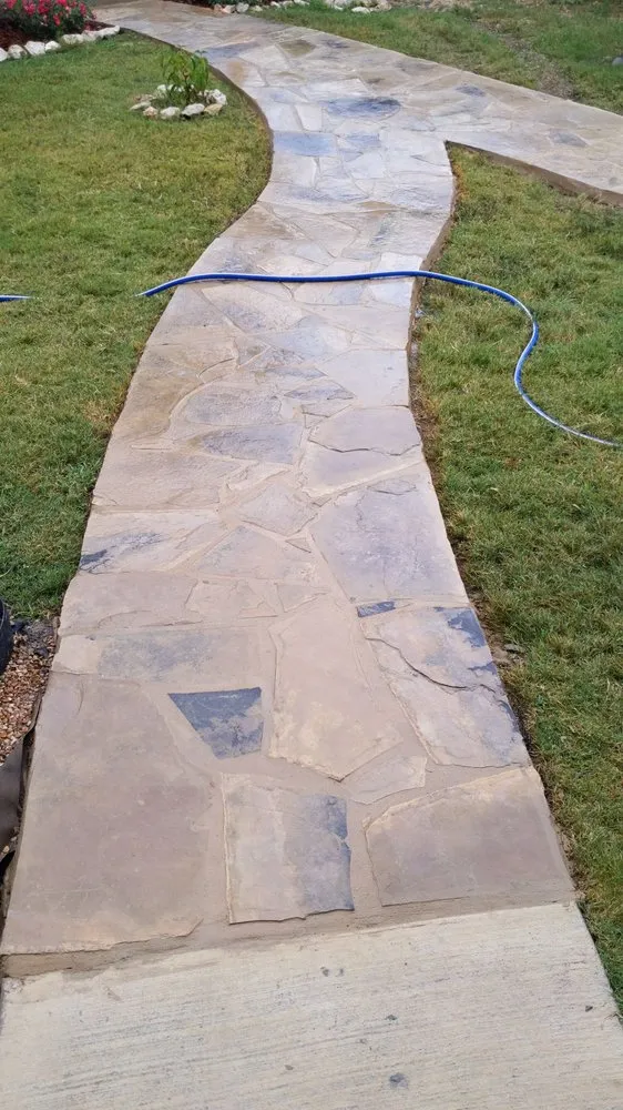 Expert yard cleanup service with custom design across Liberty Hill, TX - Martin's Masonry & Landscaping