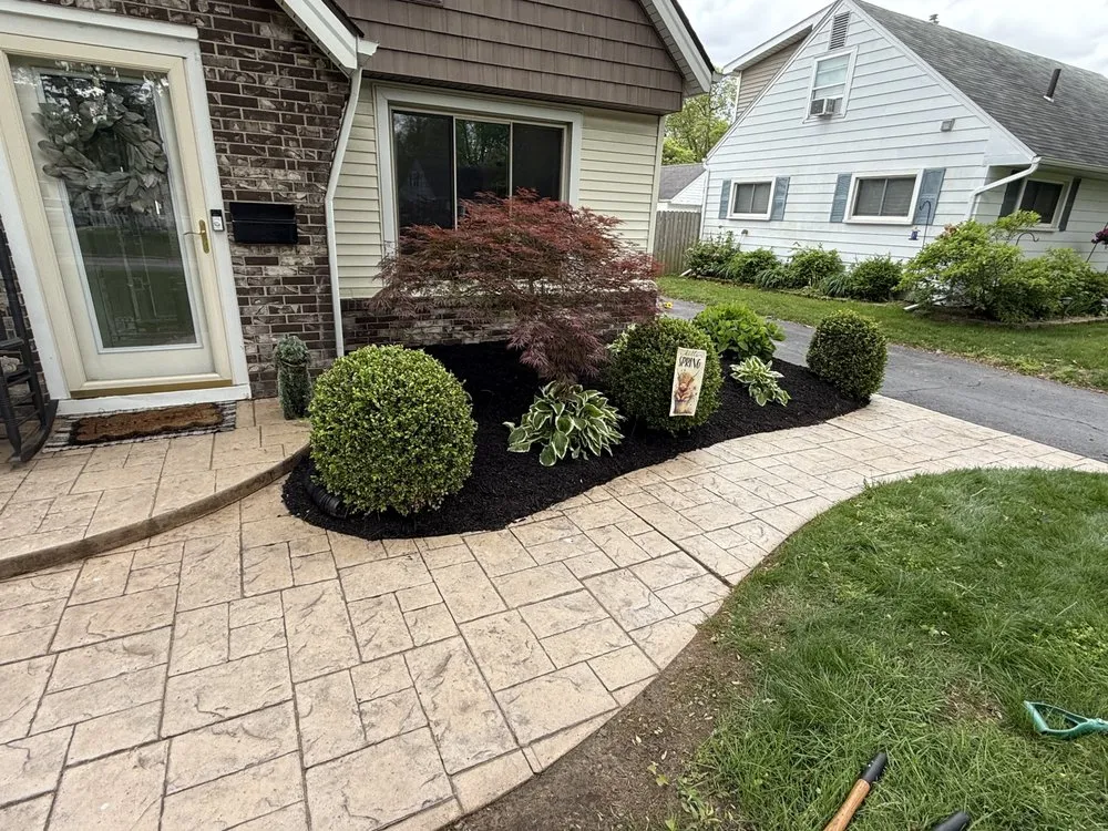 Custom yard cleanup service with custom design across Palmyra, MI - Martolocks Landscaping