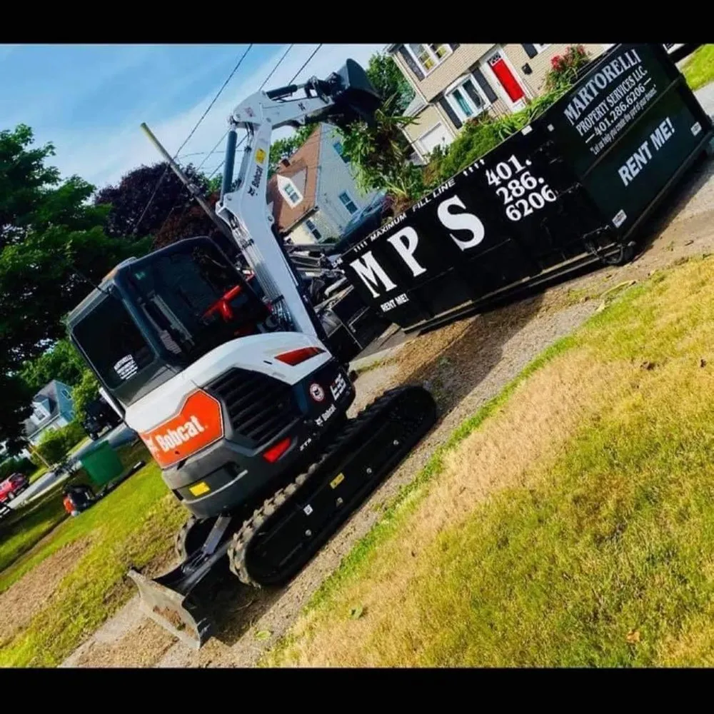 Local yard maintenance with custom design in Warwick, RI by Martorelli Property Services LLC.