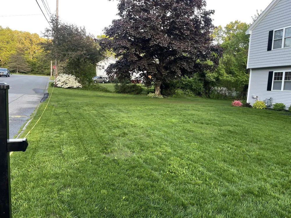 Trusted lawn mowing service for outdoor upgrades in Lowell, MA by Marty's Landscaping