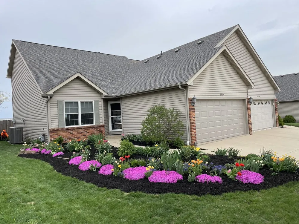 Custom landscape design with custom design in Bloomington, IL by Marvel Bros Lawncare