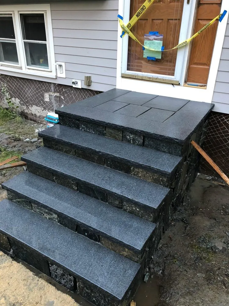 Custom lawn mowing service in Medford, MA by Masonry Mass