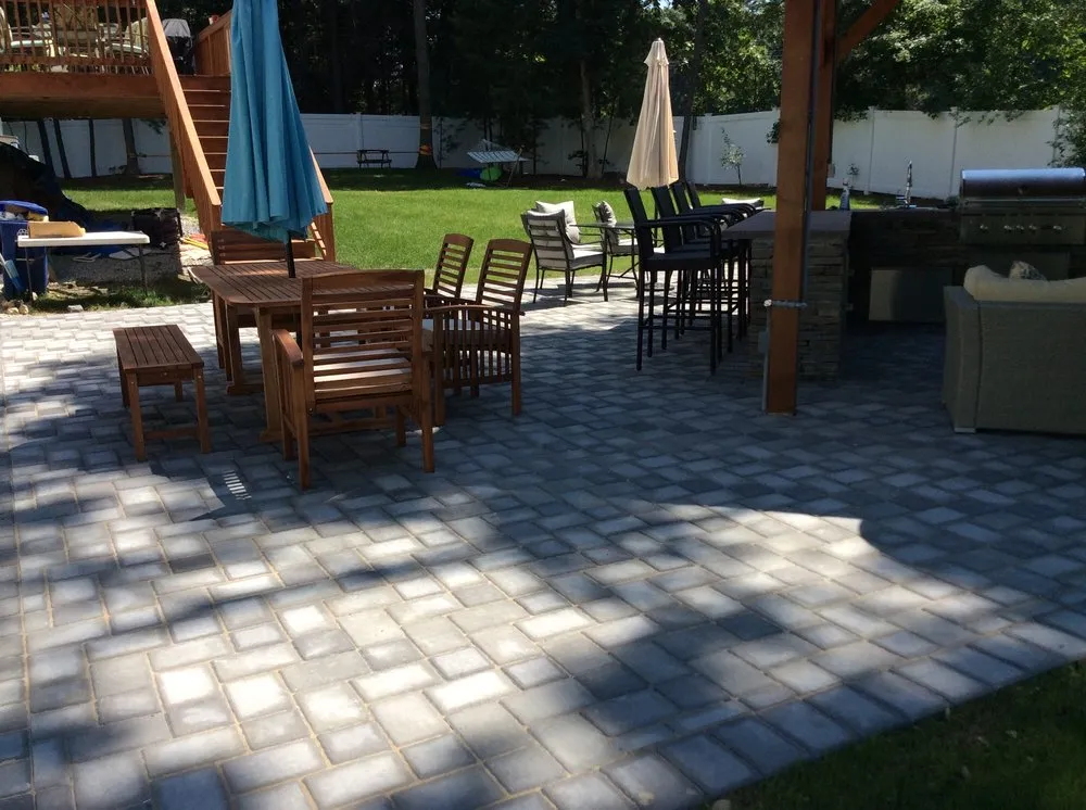 Custom yard cleanup service with custom design in Melrose, MA by Masonworks Landscapes