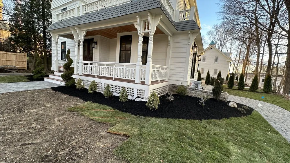 Professional lawn care service for residential properties in Marlborough, MA by Mass Landscape Masonry