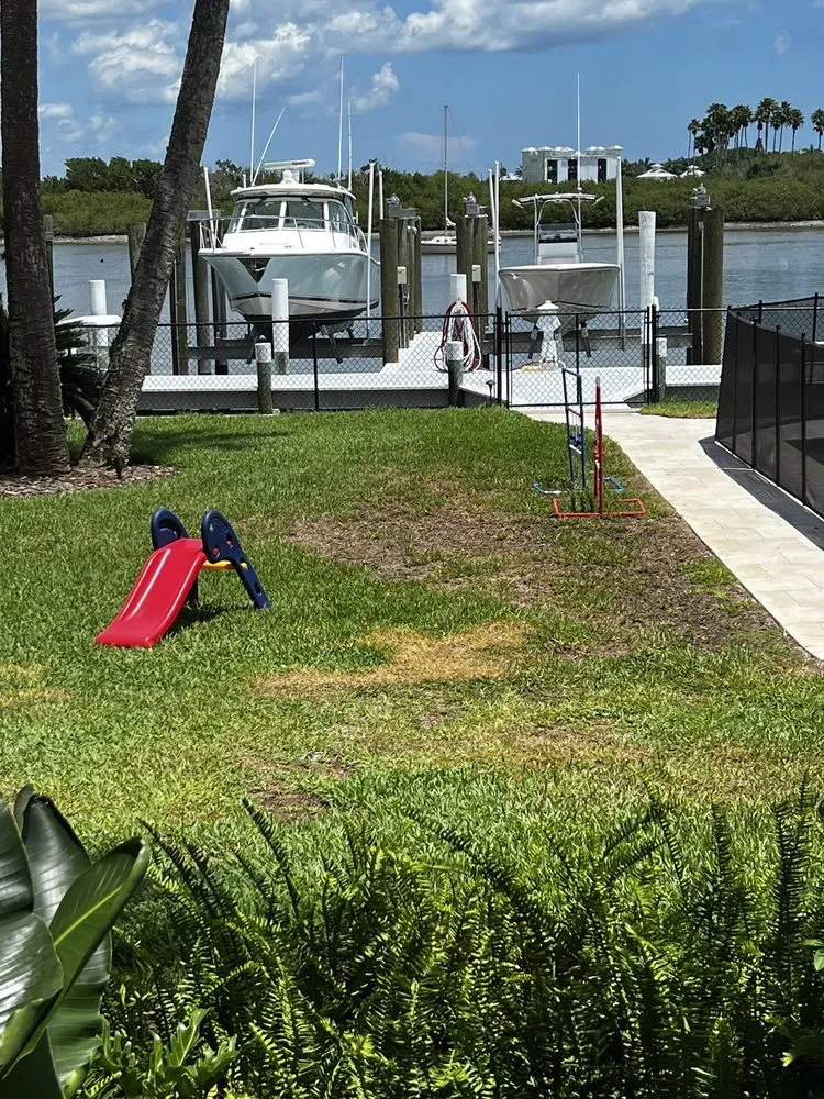 Professional lawn mowing service experts serving New Smyrna Beach, FL - Massey Services GreenUp Lawn