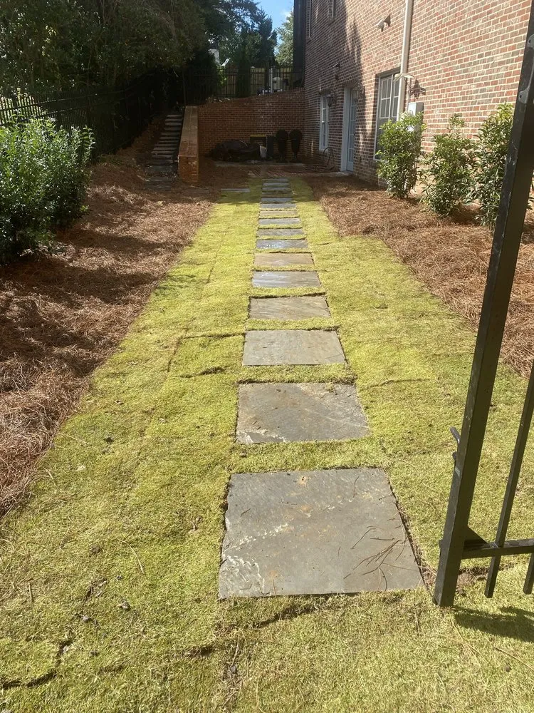 Professional yard maintenance for beautiful yards in Atlanta, GA by Master Lawns and Designs