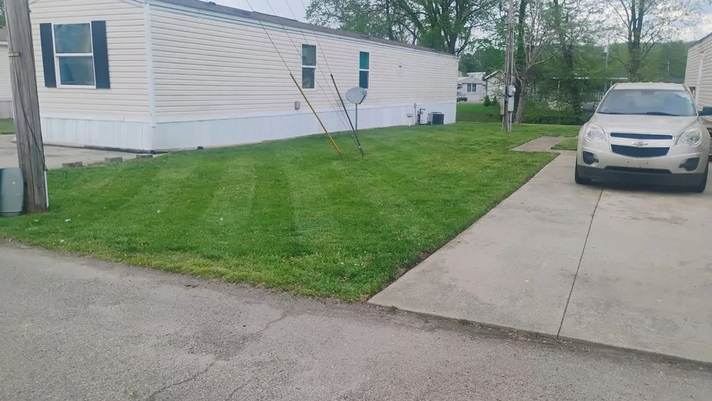 Reliable lawn mowing service for beautiful yards across Louisville, KY - Masterpiece Property Management