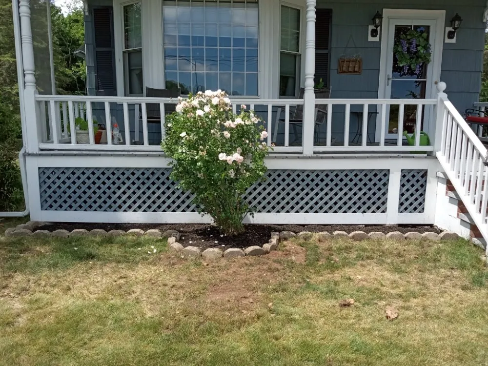 Custom residential landscaping for year-round maintenance in Lowell, MA by Mathena's Landscaping