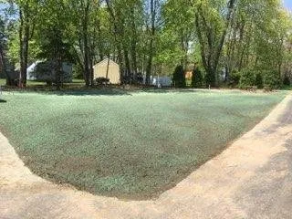 Professional garden landscaping for residential properties in Milford, MA by Matteo